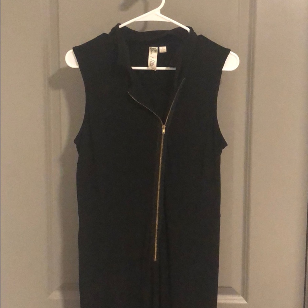 Black jumpsuit with gold zipper